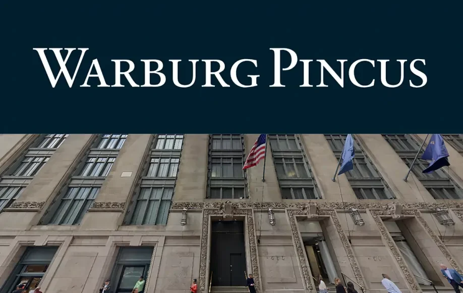 Exterior of Warburg Pincus LLC headquarters with logo above a stone building entrance, American and company flags visible.