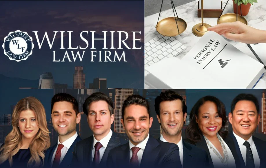 Attorneys from Wilshire Law Firm PLC with logo, city skyline, and a 'Personal Injury Law' document on a desk with justice scales.