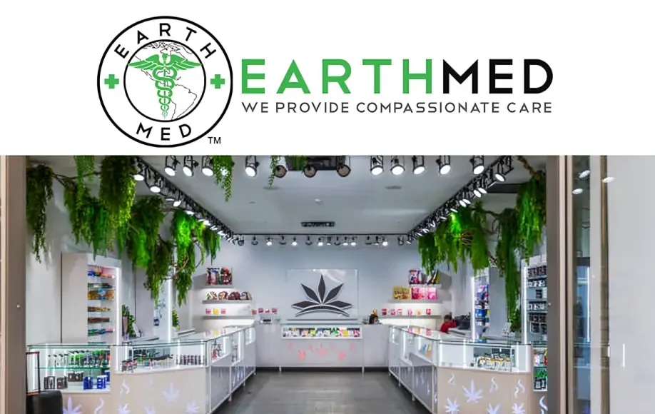 EarthMed McHenry dispensary interior with bright lights, green plants, glass display cases, and a leaf logo on the wall.