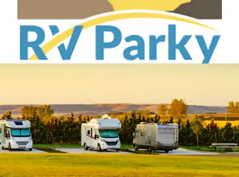 RV Parky logo above a scenic RV campground at sunset, showing three recreational vehicles parked on concrete pads with green grass and distant hills in the background.