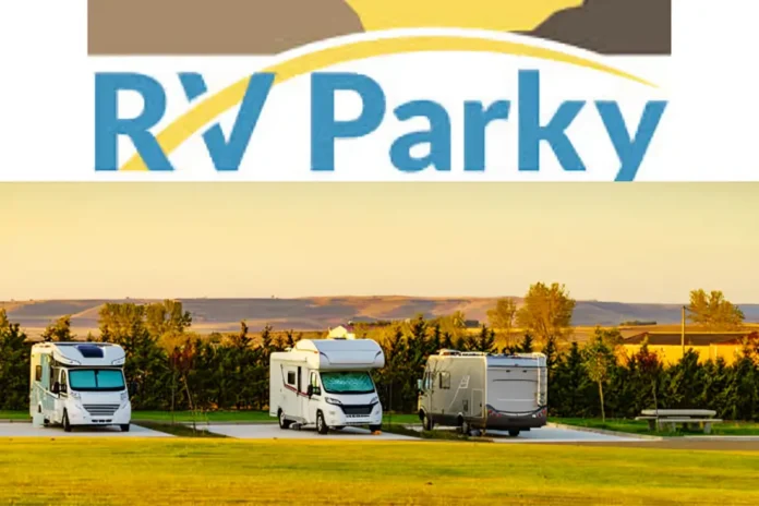 RV Parky logo above a scenic RV campground at sunset, showing three recreational vehicles parked on concrete pads with green grass and distant hills in the background.