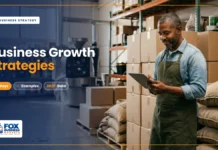 Business Growth Strategies: Proven Ways to Grow a Business Business growth strategies featured image showing a coffee roastery owner checking orders on a tablet in his expanding warehouse