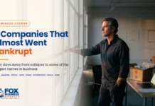Companies That Almost Went Bankrupt: 8 Incredible Comebacks Companies that almost went bankrupt: business owner looking out an office window before a comeback