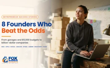 Entrepreneur Success Stories: 8 Founders Who Beat the Odds Entrepreneur success stories: a young founder working on a laptop in a garage startup workspace at sunrise. Yahi woh ek image hai jis ke alt mein focus keyword aayega.