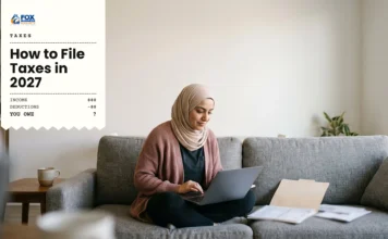 How to File Taxes in 2027: Step-by-Step Guide for Your 2026 Return Woman on a sofa with her laptop and tax forms, learning how to file taxes online