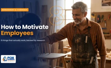 How to Motivate Employees: What Actually Works How to motivate employees featured image showing a workshop owner encouraging a young employee after she finished a handmade chair