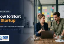 How to Start a Startup: 10 Proven Steps How to start a startup featured image showing two co-founders planning their startup at a laptop in a co-working space
