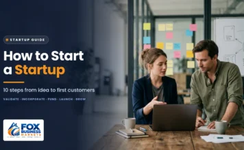 How to Start a Startup: 10 Proven Steps How to start a startup featured image showing two co-founders planning their startup at a laptop in a co-working space