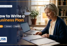 How to Write a Business Plan: Step-by-Step Guide How to write a business plan featured image showing a woman reviewing her printed business plan at a home office desk