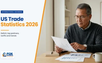 US Trade Statistics 2026: Deficit, Top Partners, Tariffs and Trends US trade statistics: trade consultant reviewing printed charts of US import and export data at his desk